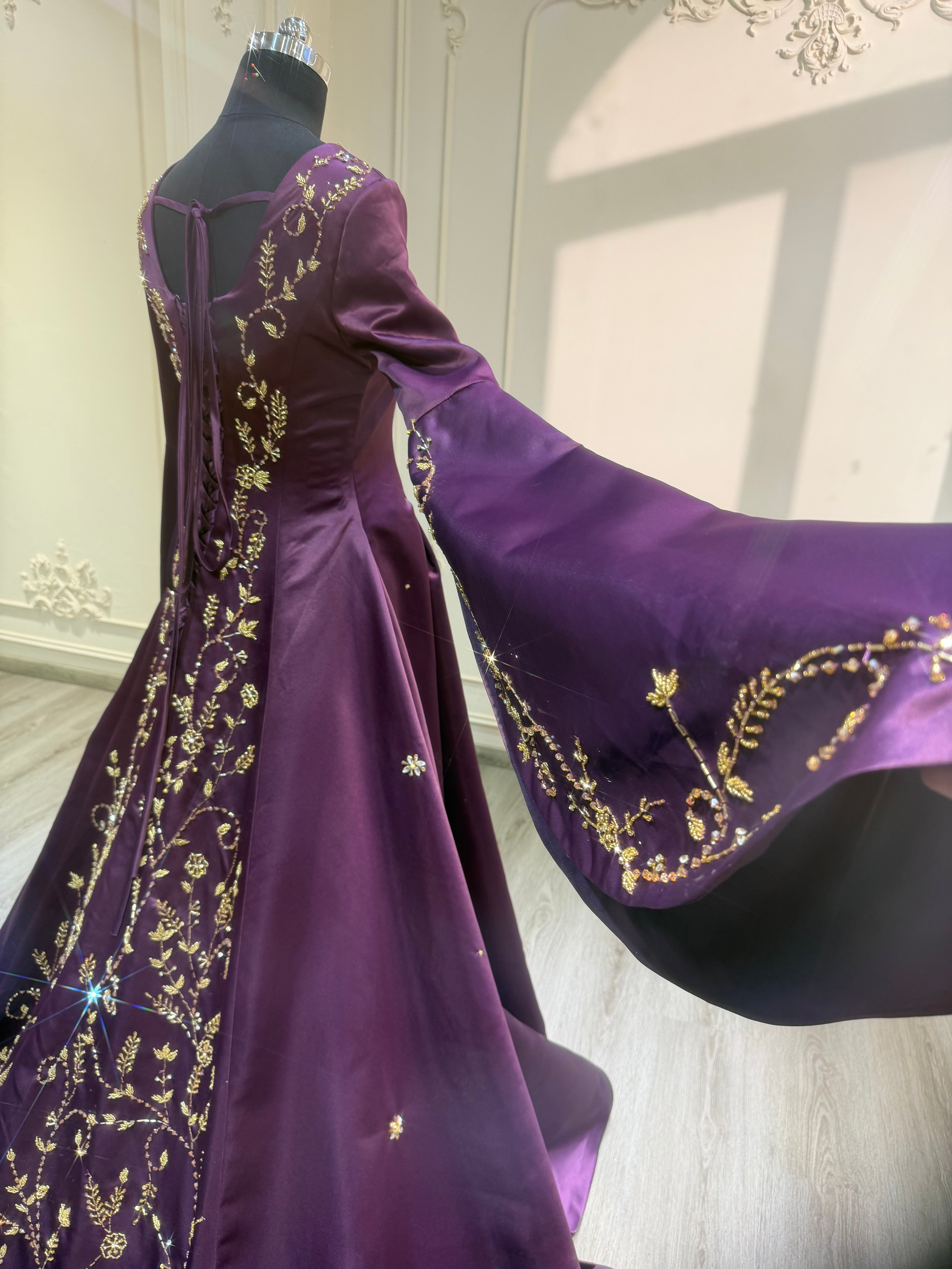 Dark purple satin dress with hand embroidered tail and veil فستان ساتان بنفسجي مع شك يدوي بالذيل بالكامل