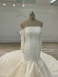 Mermaid off-white dress with alencon lace and handmade flowers فستان بقصة حورية البحر مع دانتيل ثقيل و ورد باليد