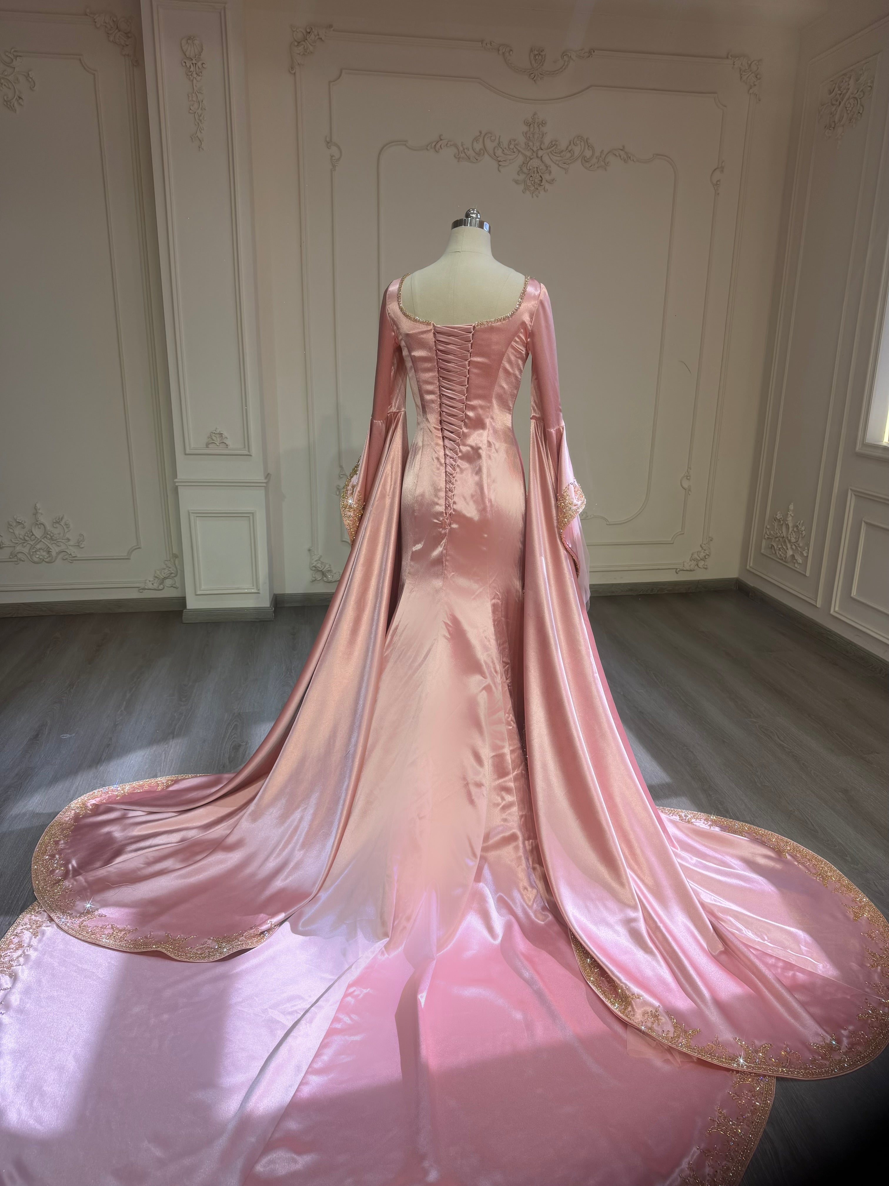Peach henna dress with heavy hand beading فستان حنه مشمشي مع شك يدوي ثقيل