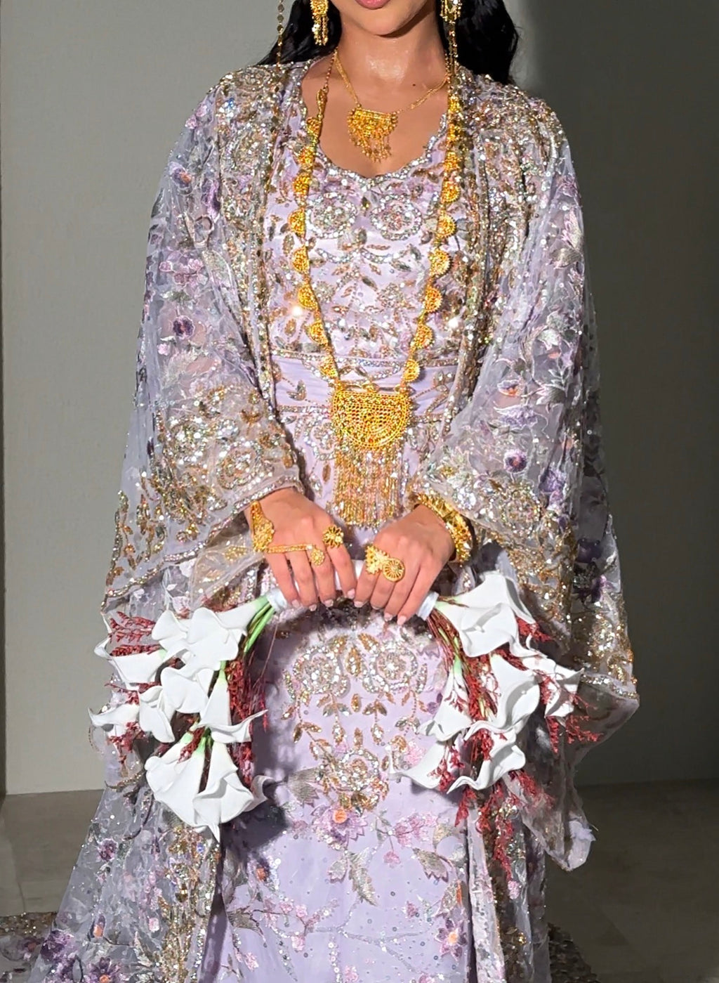 Purple thoub with embroidery ثوب بنفسجي مع شك يدوي